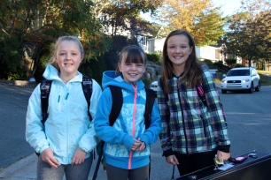 Basinview Drive Community School students Kate, Rory and Gillian participating in the launch of International walk to school month (IWALK) on Oct. 2 and say they enjoy walking to school, “rain or snow.”